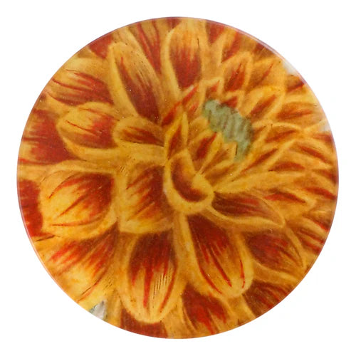 Round glass plate with a sunflower design on a white background