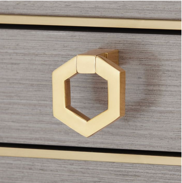 brass drawer detail on desk