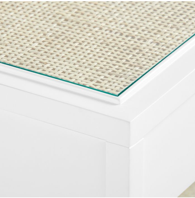 edge detail of cane and glass top of side table