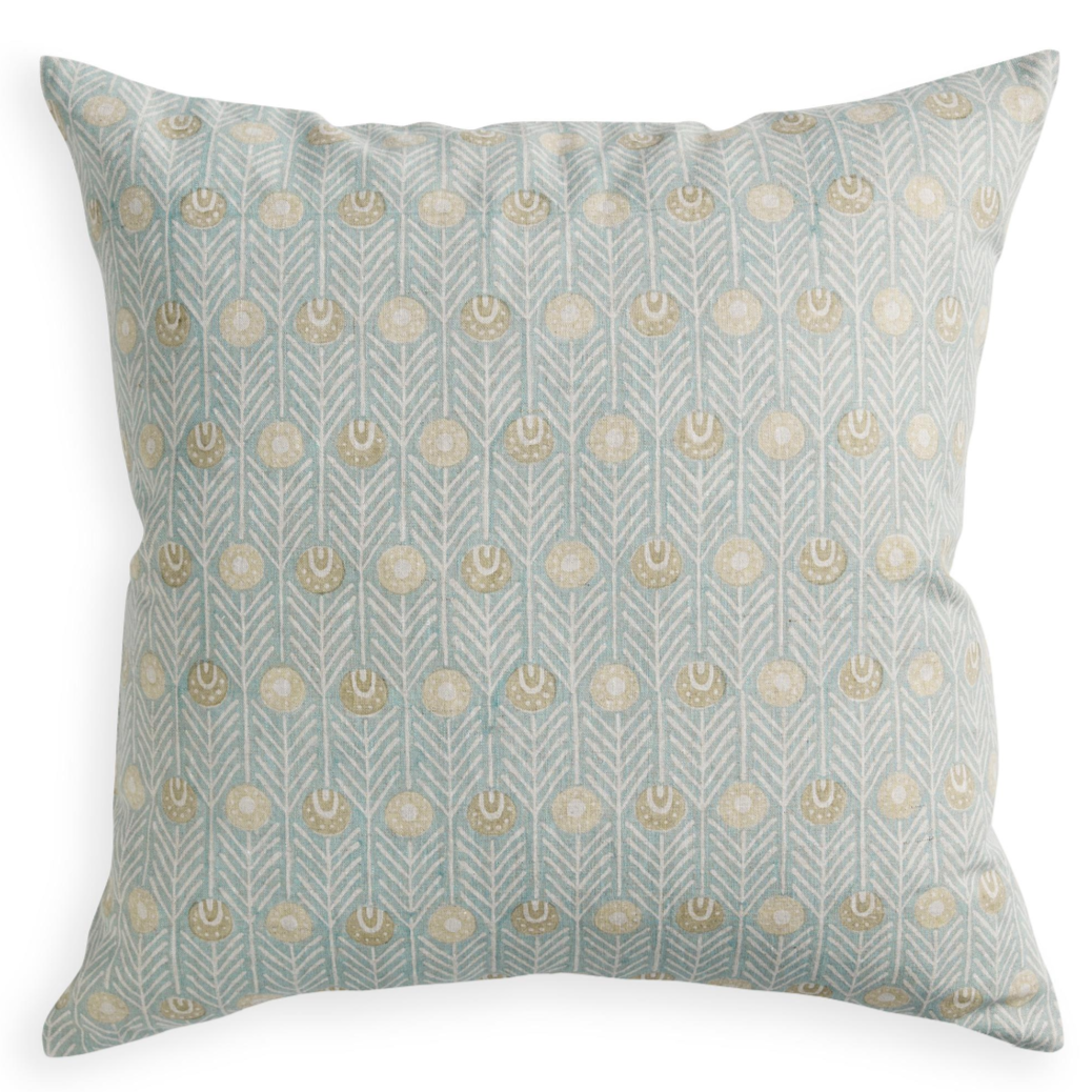 pale blue and tan feather-like pattern on square pillow