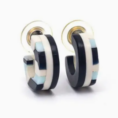front view of black, white, and blue acrylic hoop earrings