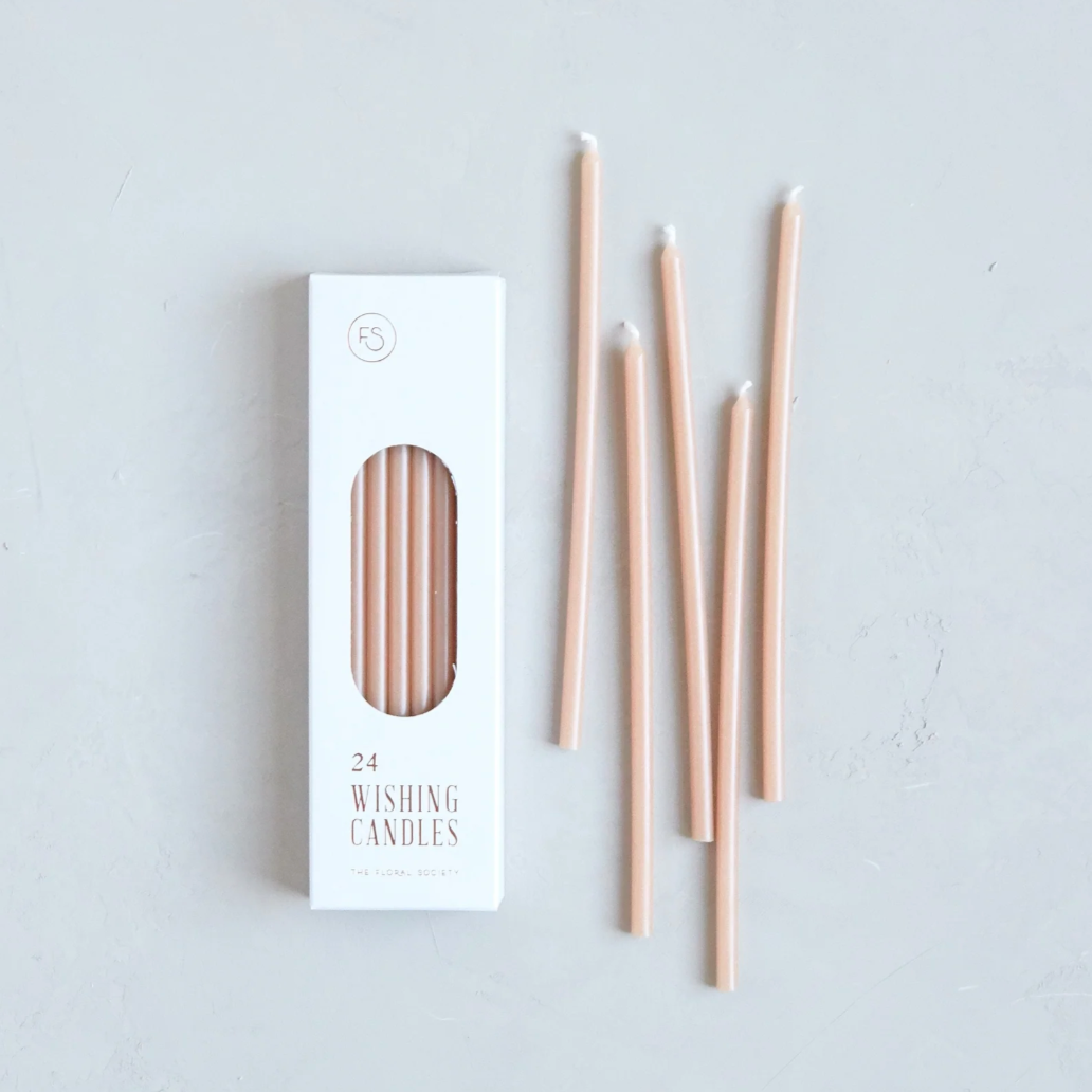 thin pink candle tapers loose out of box