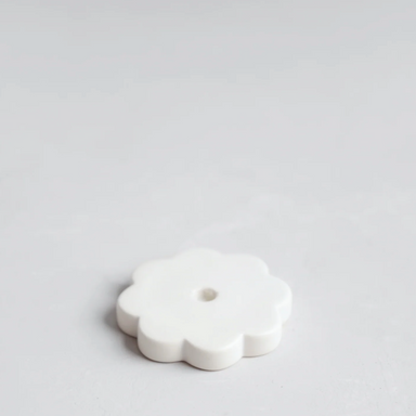 flower-shaped white candleholder