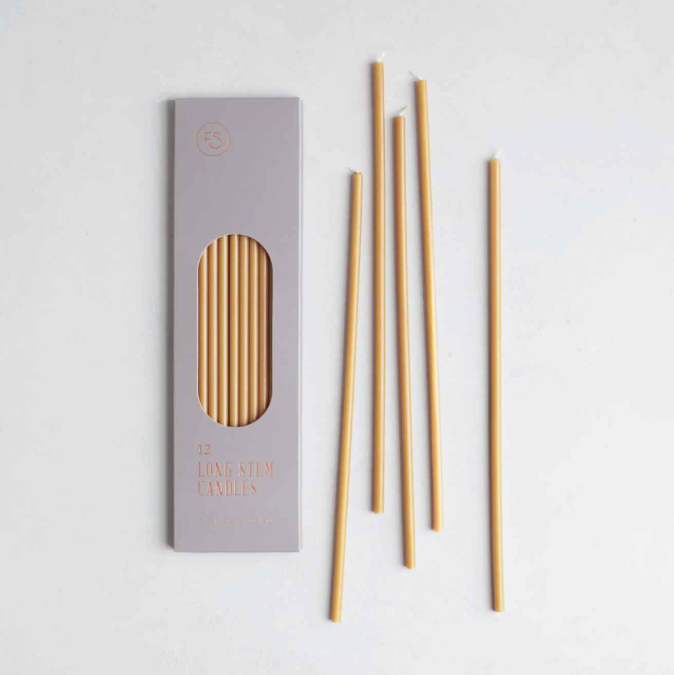 slender beige taper candles