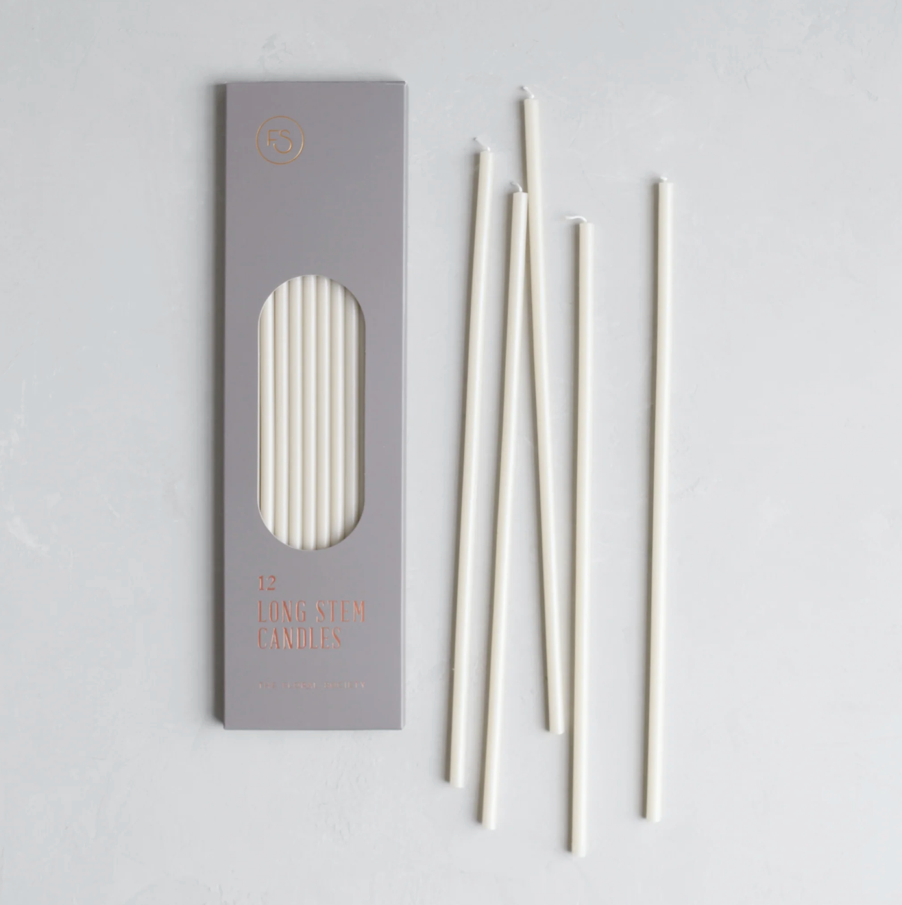 slender white tapers