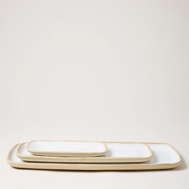 set of white pottery trays