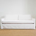 white sofa with bench seat and two loose back cushions