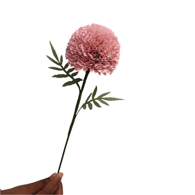 pink paper flower on stem