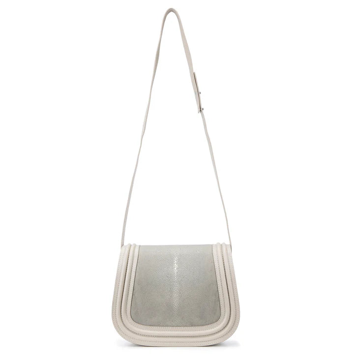 Handbag with a strap on a white background