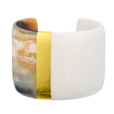 Ceramic bracelet with gold band on a white background