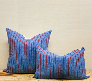 blue and red stripe pillows, one square and one oblong