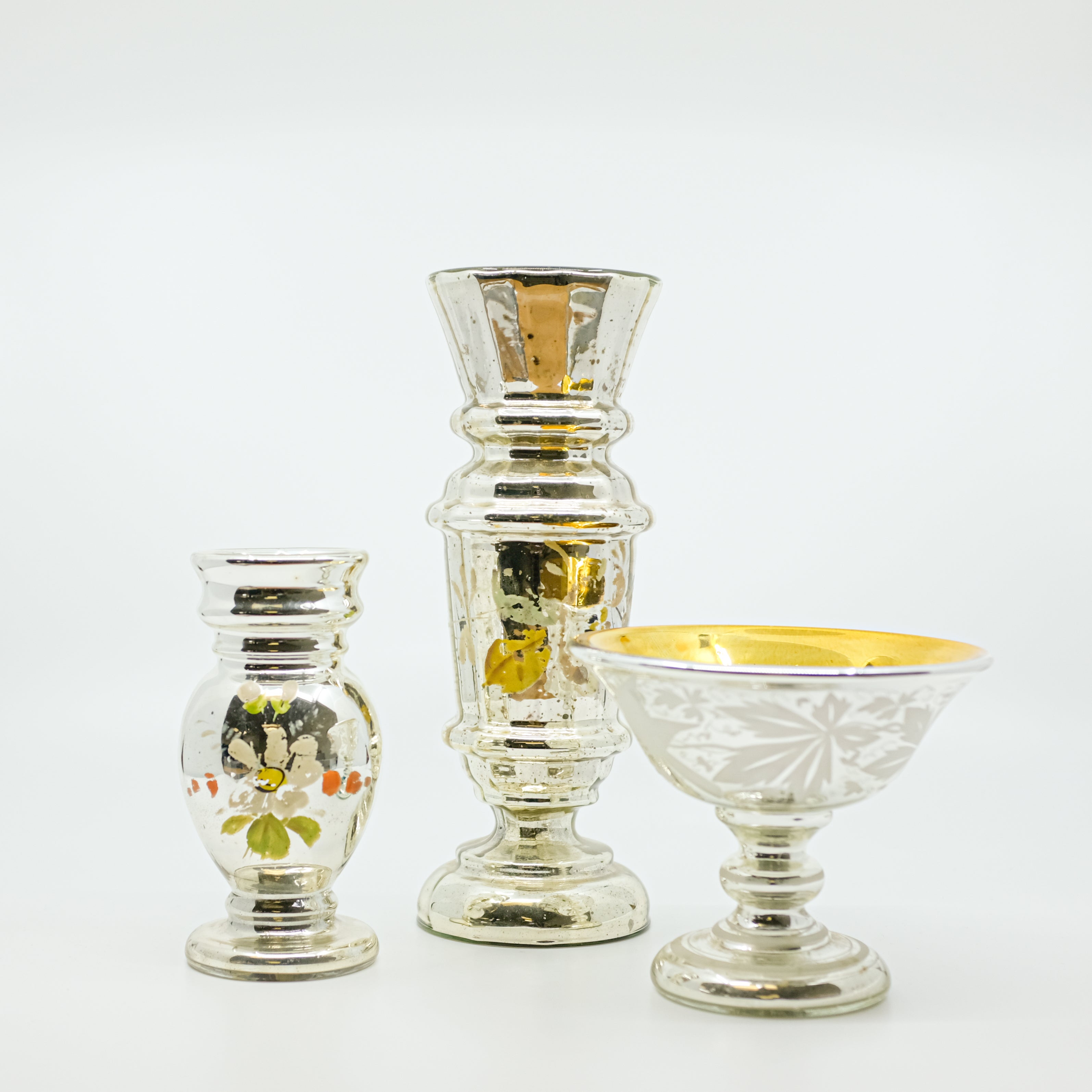 trio of mercury glass vases