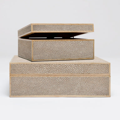 two stacked sand colored boxes