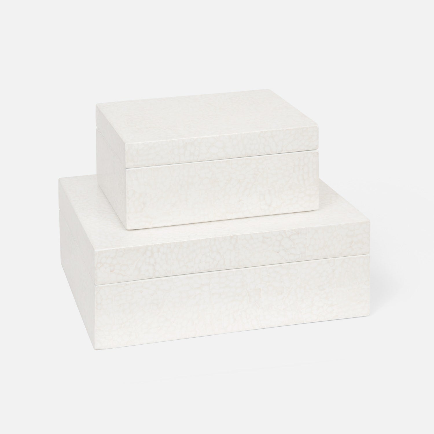 stacked white decorative boxes
