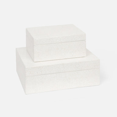 stacked white decorative boxes