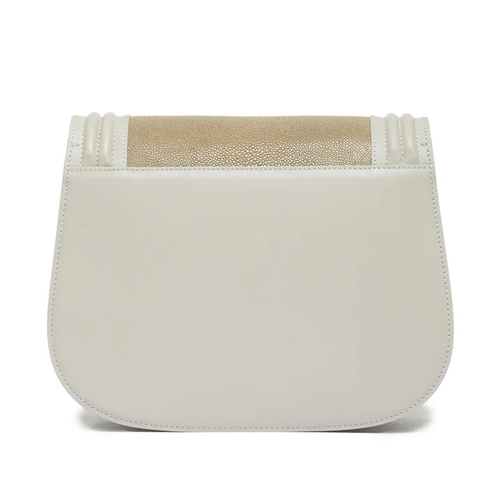White saddle bag with beige top section on a white background