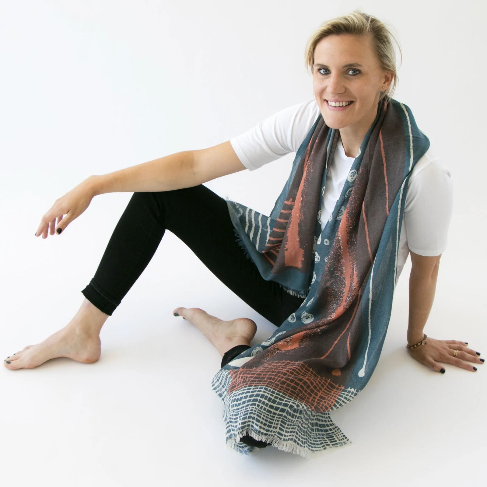 woman modeling 100% merino wool scarf