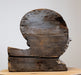 back view of antique wood carved architectural fragment