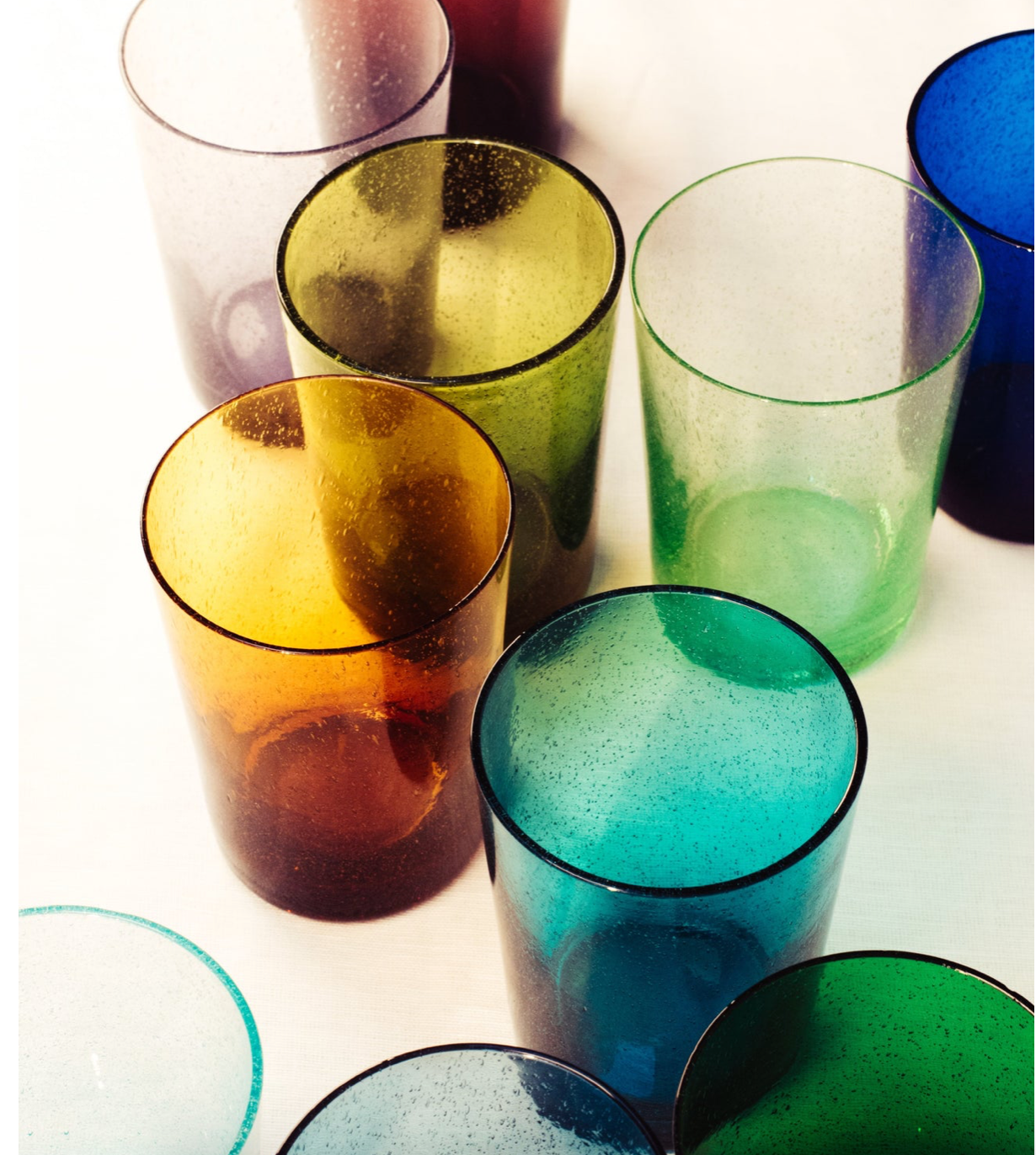 grouping of recycled glass tumblers
