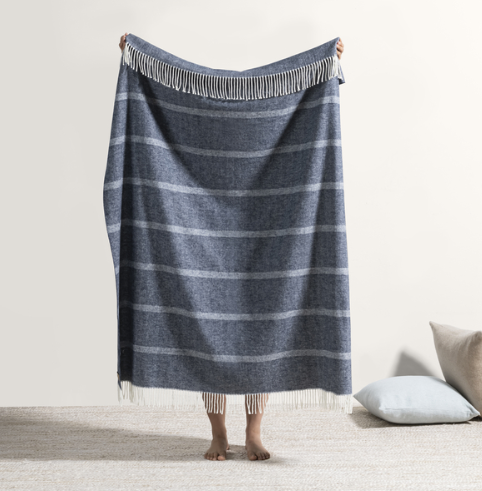 dark blue striped throw with fringe