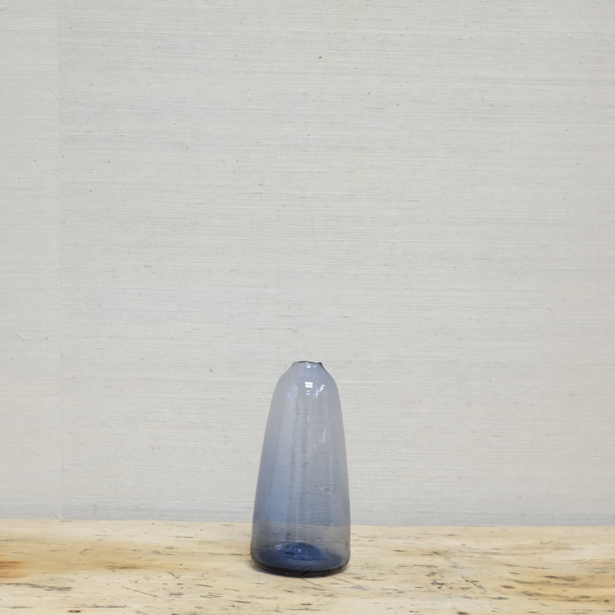 cylinder-style transparent blue glass vase