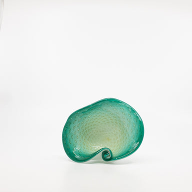 teal murano glass bowl on side