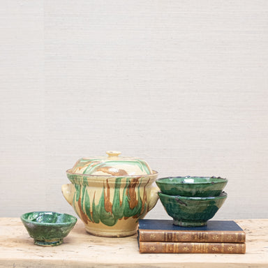 vignette of pottery and antique books