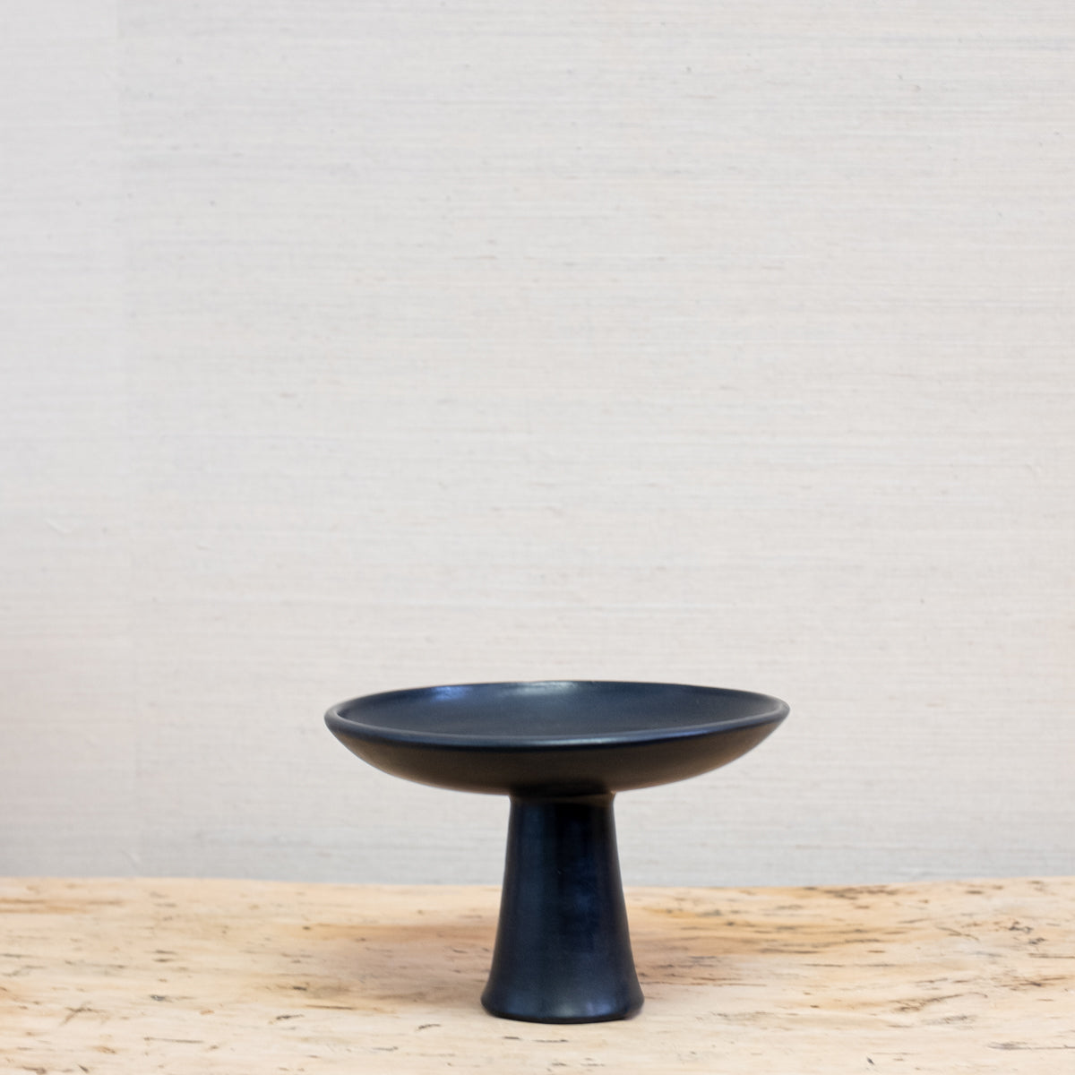black pottery dish