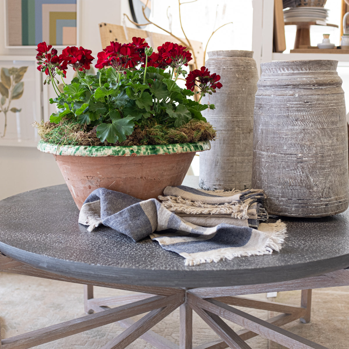 antique bowl and wood vessels on coffee table