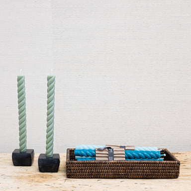 sage green twist taper candles in black forged iron holder
