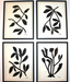 Four black and white wall art prints of leaf designs on a light background.