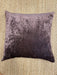 Textured sugar brown pillow on a beige carpet