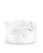 A white ceramic bow with a highly organic, wavy, and fluid sculptural design, photographed on a seamless white background.