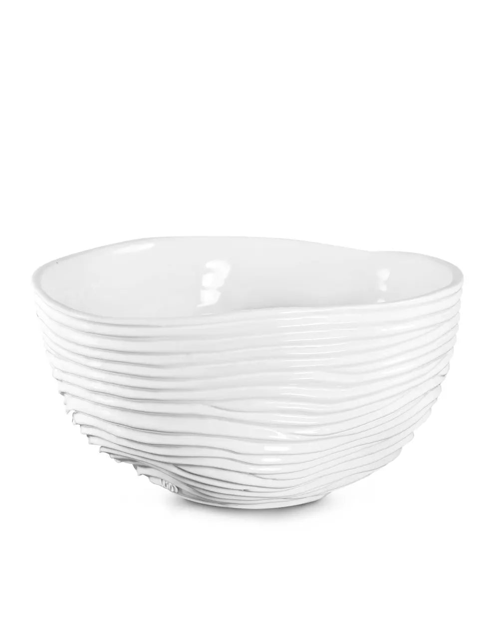 White ceramic bowl with wavy design on a white background