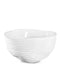 White ceramic bowl with wavy design on a white background