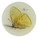 Butterfly illustration on a round ceramic tile with 'Fig. 3.' text.