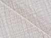 Close-up of textured soft taupe rug