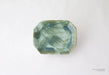 Green ceramic dish on a white background