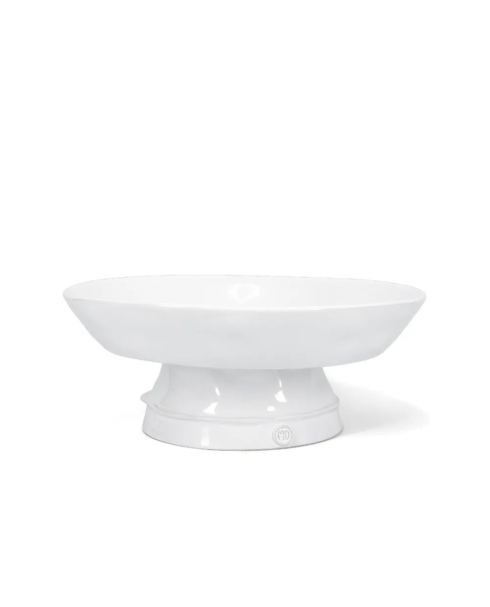 A white ceramic pedestal bowl with a wide, shallow oval bowl and a flared base, shown on a clean white background.