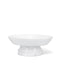 A white ceramic pedestal bowl with a wide, shallow oval bowl and a flared base, shown on a clean white background.