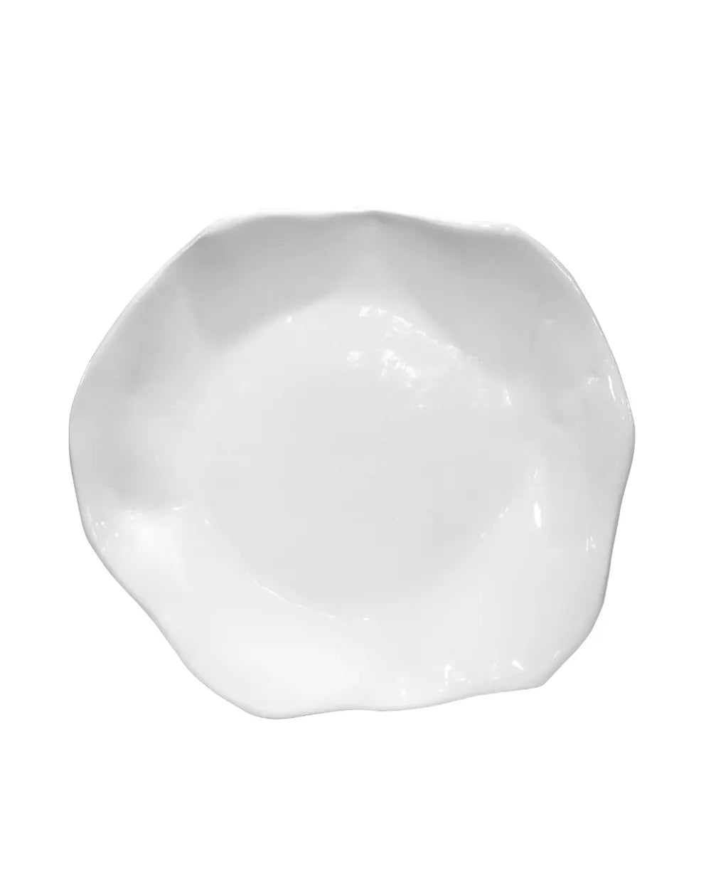 A white ceramic plate with an organic, wavy scalloped rim, photographed from directly above on a solid white background.
