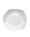 A white ceramic plate with an organic, wavy scalloped rim, photographed from directly above on a solid white background.