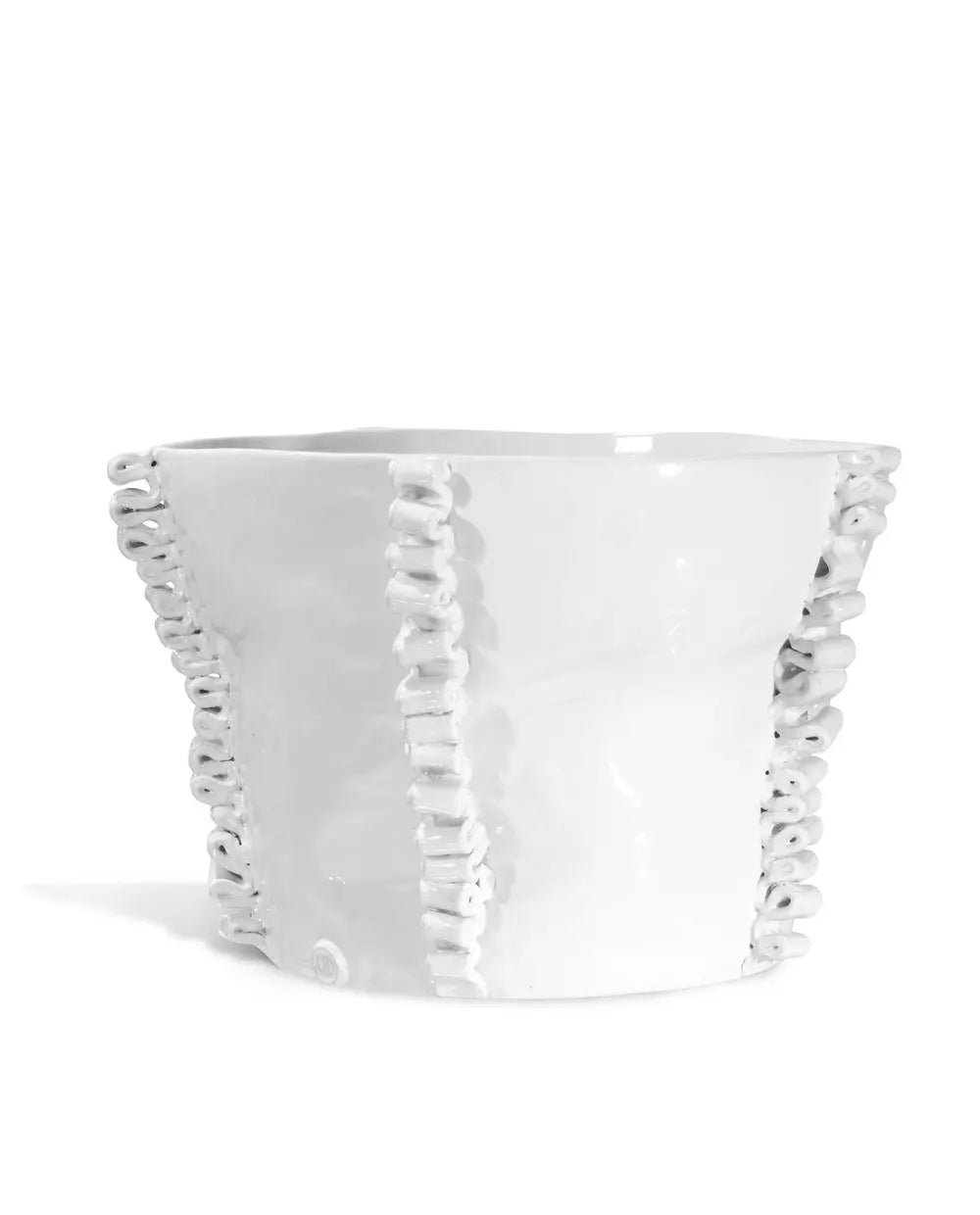White ceramic planter with textured rim on a white background