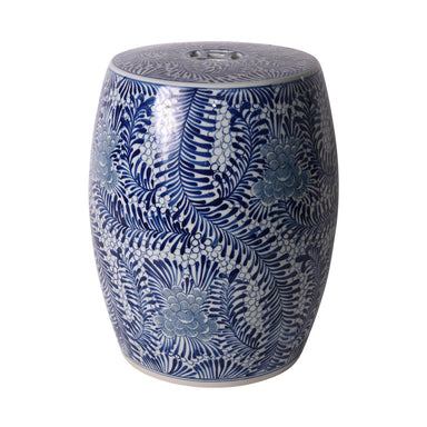 Blue and white floral patterned ceramic stool on a white background
