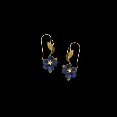 Pair of floral earrings with blue flowers and gold accents on a black background