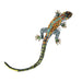 Decorative lizard figurine with colorful beadwork on a white background