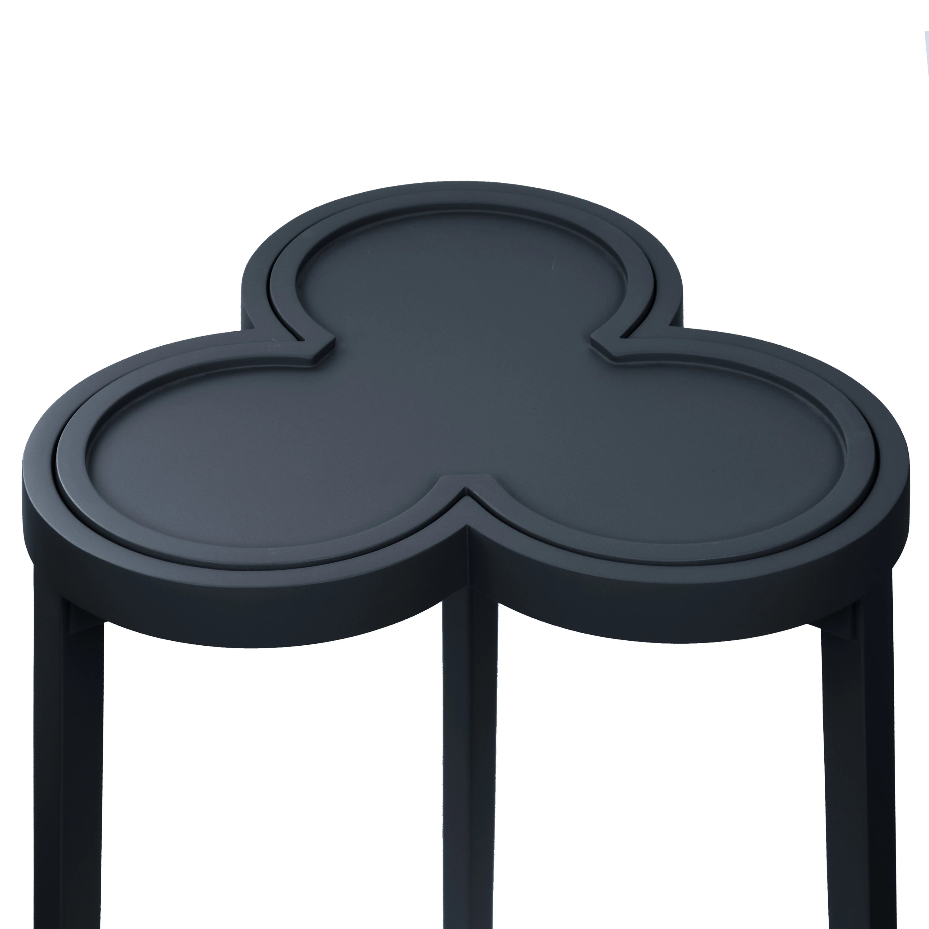 Navy blue side table with a clover shape on a white background