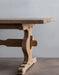 detail view of end of wood dining table