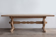 antique trestle table on concrete floor
