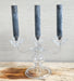 glass candelabra with dark candles